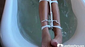 horny brunette tied up teased wet in bathtub feet fetish